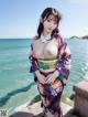 A woman in a kimono posing by the water.