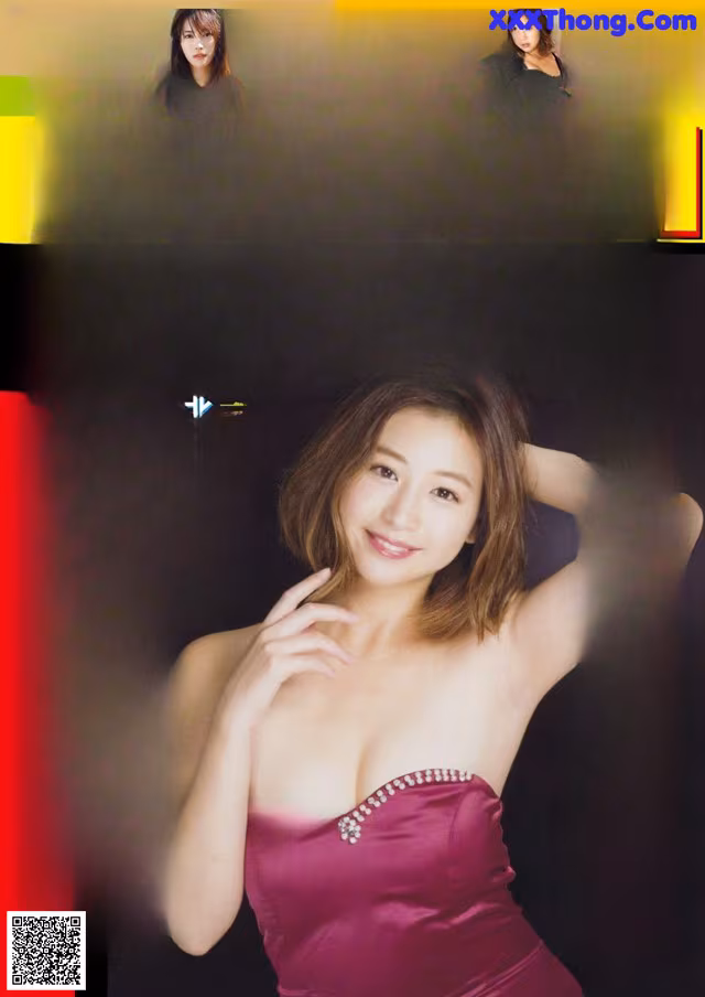 A magazine with a picture of a woman in a red dress.